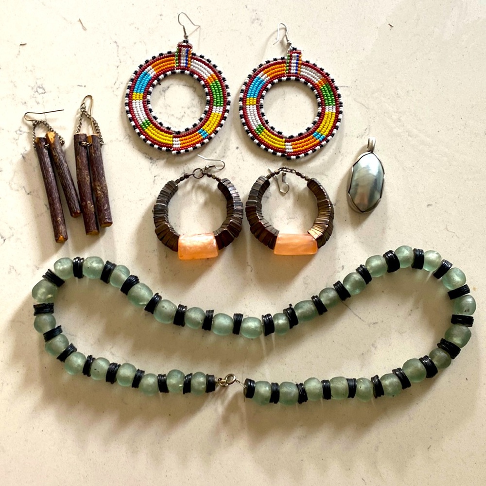 lot of jewelry, including earrings, pendant, and necklace